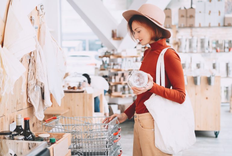 Woman_Shopping_With_Reusable_Bag_At_Supermarket